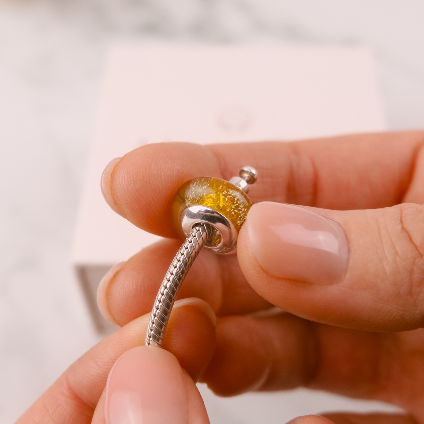 Your Ashes into Glass Charm Bead can be made in a range of colours, with a choice of Sterling Silver, Gold, or White Gold.
Our Engraver will finish your memorial Charm with a complimentary engraving of up to 25 characters.
#ashesintoglass #memorialjewellery